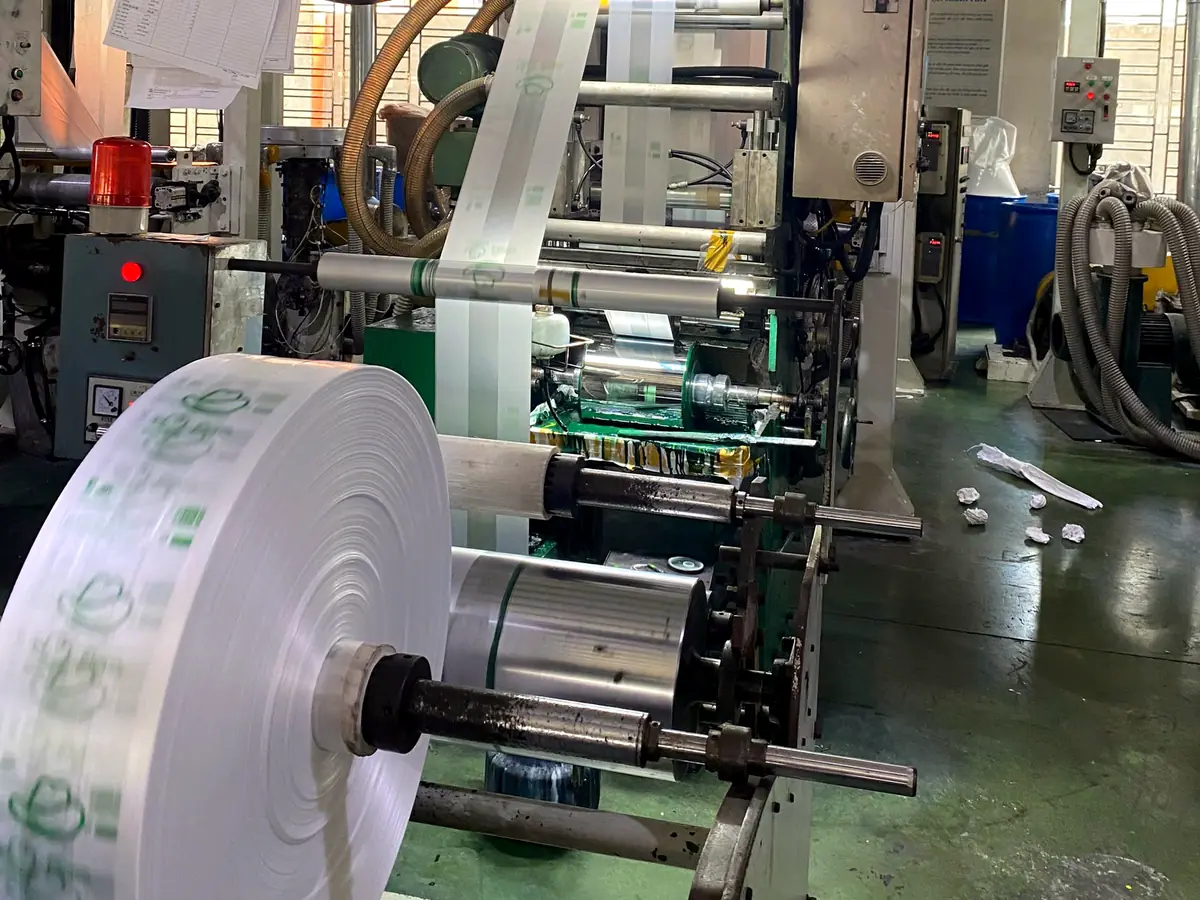 Printed film roll on a blowing line at Bupa Plastic