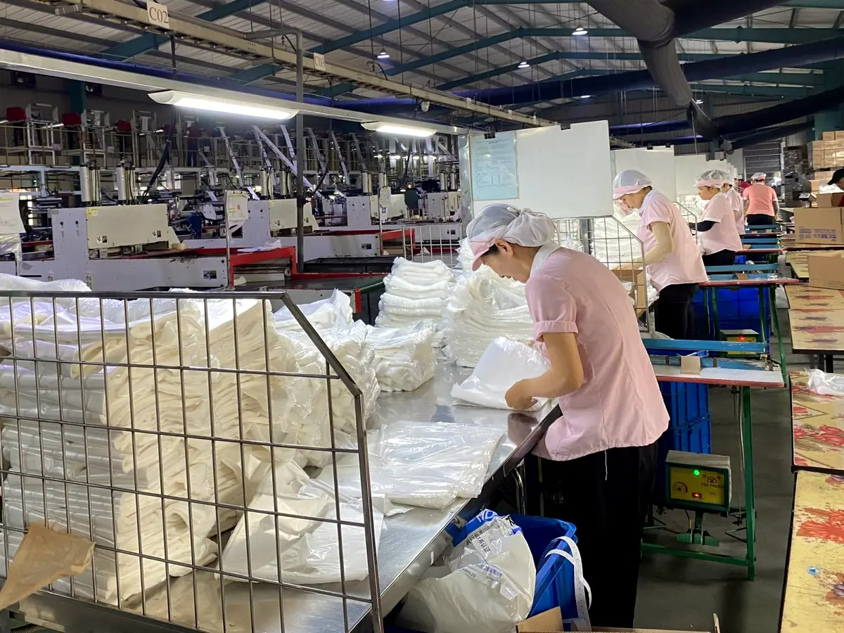 Bag inspection at the Bupa Plastic factory