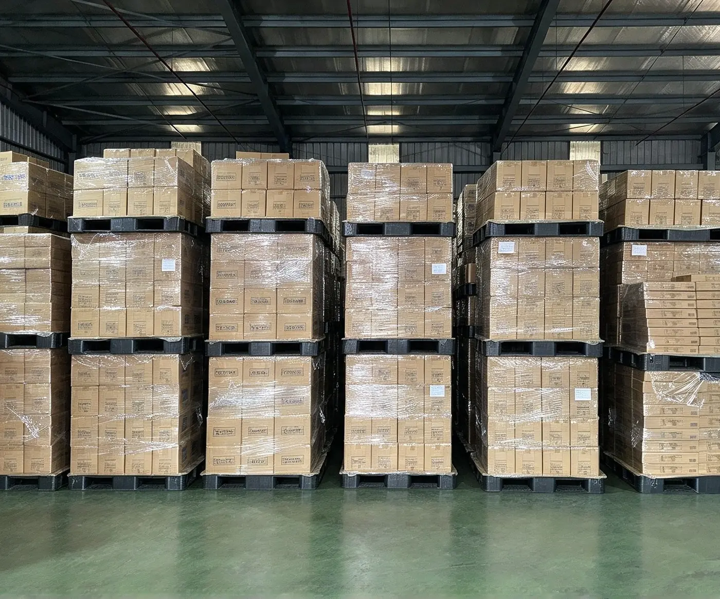 Palletized cartons of finished bags in the Bupa Plastic warehouse