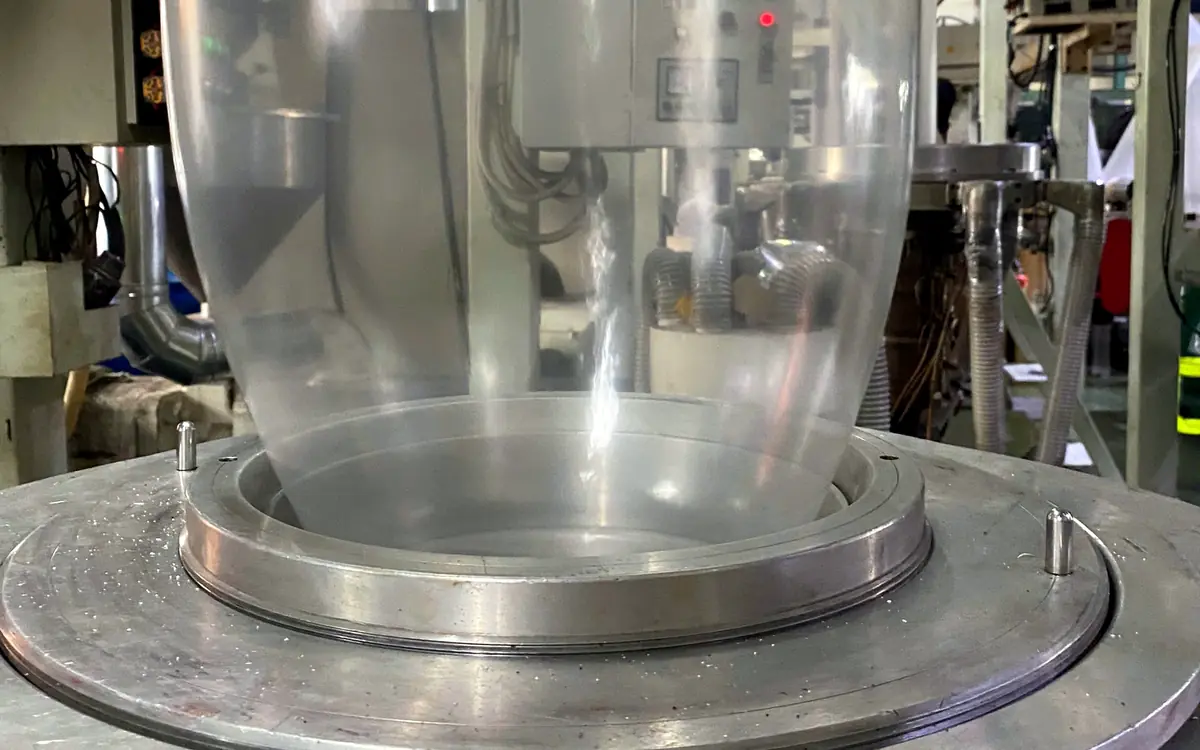 Film bubble leaving the die of a blowing line at the Bupa Plastic factory